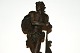 Auguste Moreau, 1834-1917,Patinated sculpture in painted zinc.