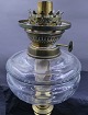 Petroleum table lamp in brass with Opaline shade from the first half of the 1900s. Height approx. 62cm. The clear glass tube is missing.