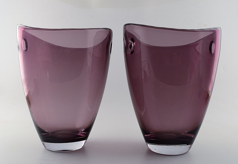 A pair of large Scandinavian art glass vases in purple.