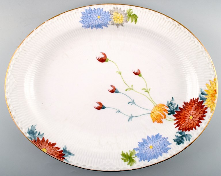 Antique and rare Royal Copenhagen large dish decorated with flowers.