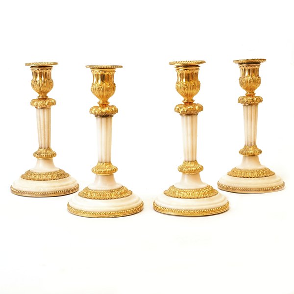 Set of four candle holders, marble and bronzeFrance around 1810