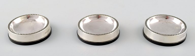 Vera Ferngren for GAB, Sweden.Three coasters in silver and bakelite.