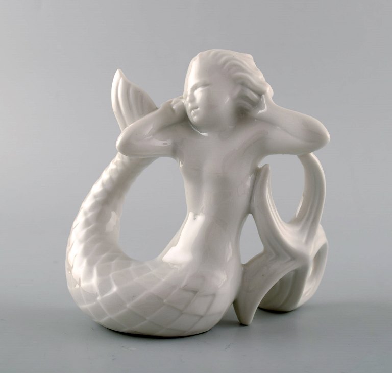 Harald Salomon for Rörstrand, hvidglaseret figur forestillende faun/pan.  