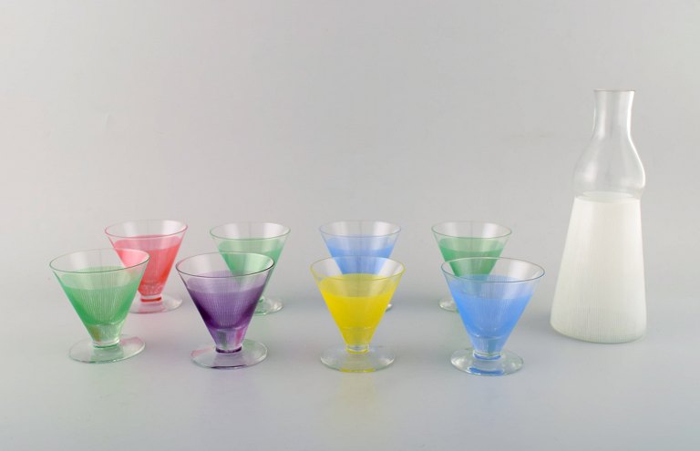 8 colorful cocktail glasses with decanter/bottle. "Party", Bengt Orup, Johansfors. Designed in 1953. Swedish design.