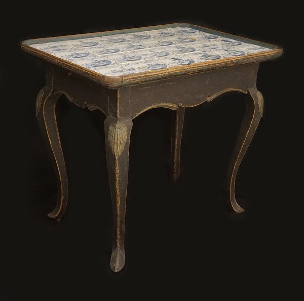 A Rococo tile top table with blue Dutch tiles. Denmark circa 1760. H: 75cm. Top: 59x85cm