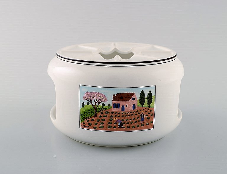Villeroy & Boch Naif tea cozy for tea lights in porcelain decorated with naivist village motifs.