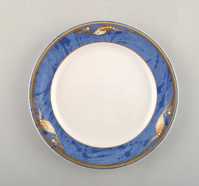 Royal Copenhagen. "Magnolia" plate. Five pieces in stock. Late 20th century.