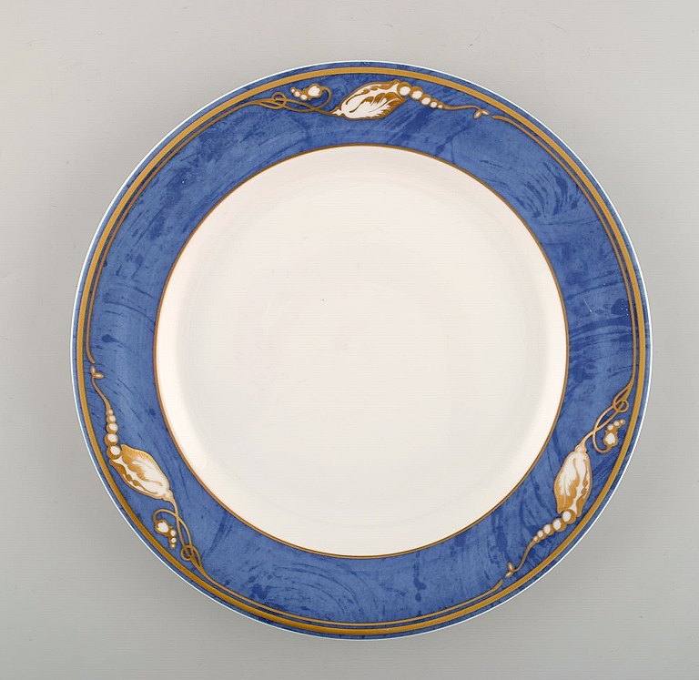 Royal Copenhagen. "Magnolia" dinner plate. 10 pieces in stock. Late 20th century.