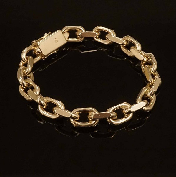 Bjarne Nordmark Henriksen: Kraftig anker armlænke i 8kt guld. Ledstr. 1,6x1cm. L: 24cm. V: 76,3gr