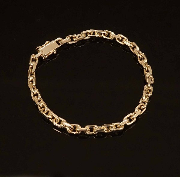 Hermann Siersbøl: Anker armlænke i 8kt guld. Ledstr. 0,7x0,4cm. L: 19,5cm. V: 14,5gr