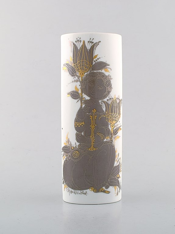 Bjørn Wiinblad for Rosenthal Studio Line. Porcelain vase decorated with woman and flowers. 1980