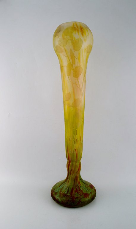 Daum Nancy, France. Colossal art deco floor vase in frosted mouth blown art glass carved with motifs in the form of flowers and leaves. 1920/30