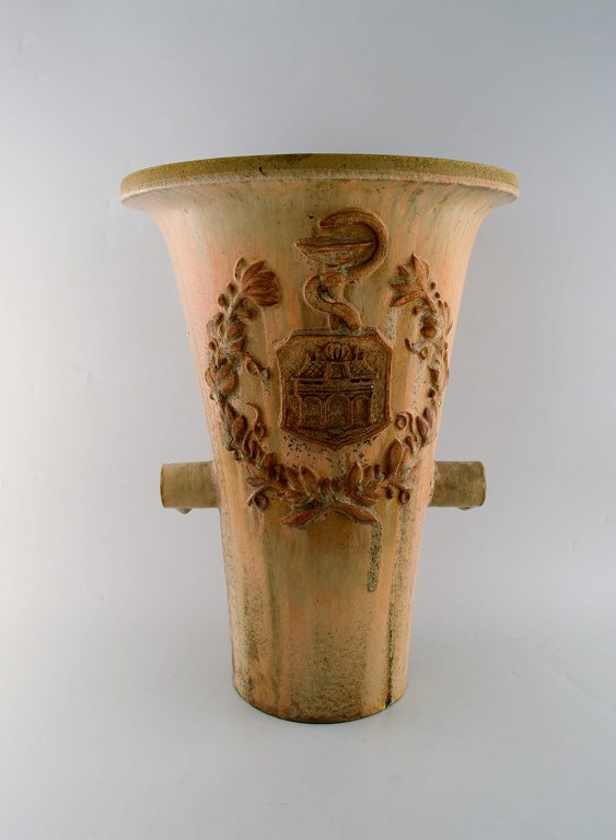 Colossal Arne Bang unique vase in glazed ceramics with brand from pharmacy in Aalborg, Denmark. Dated 1933. Decorated with Rod of Asclepius as a symbol of medicine.