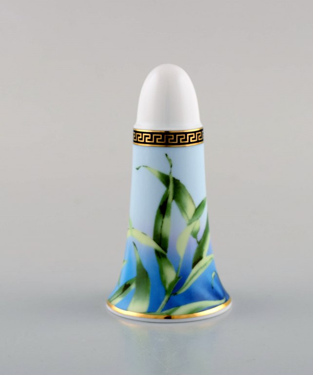 Gianni Versace for Rosenthal. "Jungle" porcelain salt shaker with gold decoration and green leaves. Late 20th century.
