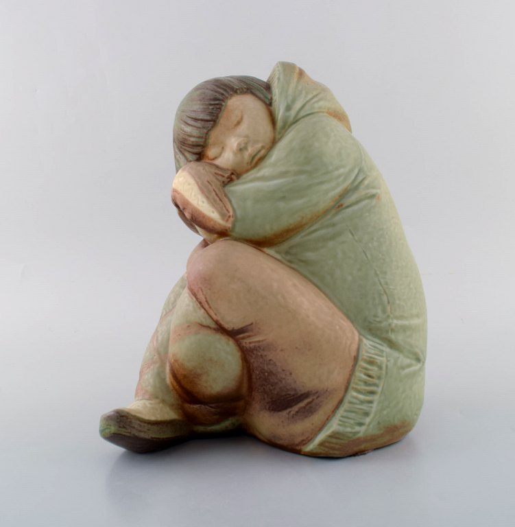Lladro, Spain. Large sculpture in glazed ceramics. Eskimo girl. 1980s.