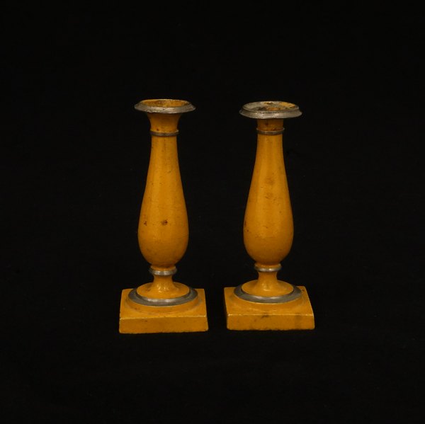 A pair of 19th century small yellow decoarated pewter candlesticks. Denmark circa 1830. H: 10cm