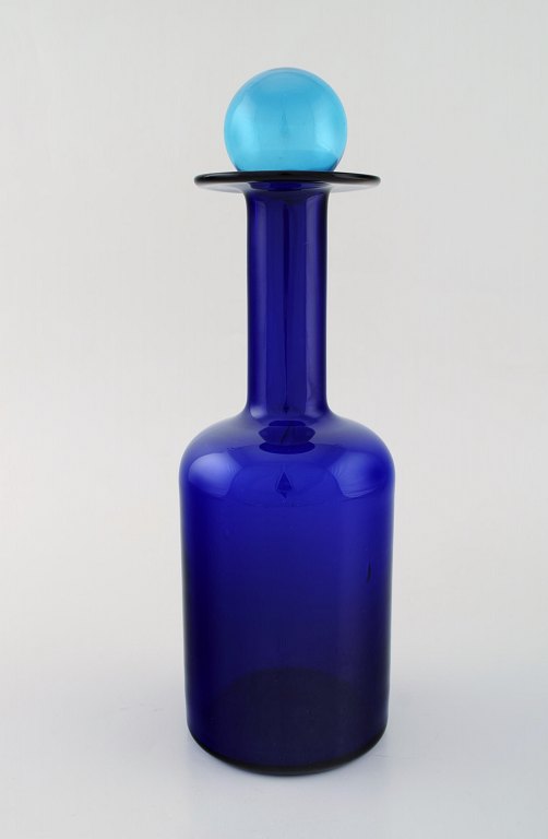 Otto Brauer for Holmegaard. Large vase / bottle in blue art glass with blue ball. 1960