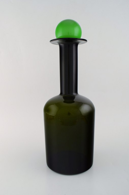 Otto Brauer for Holmegaard. Large vase / bottle in green art glass with green ball. 1960