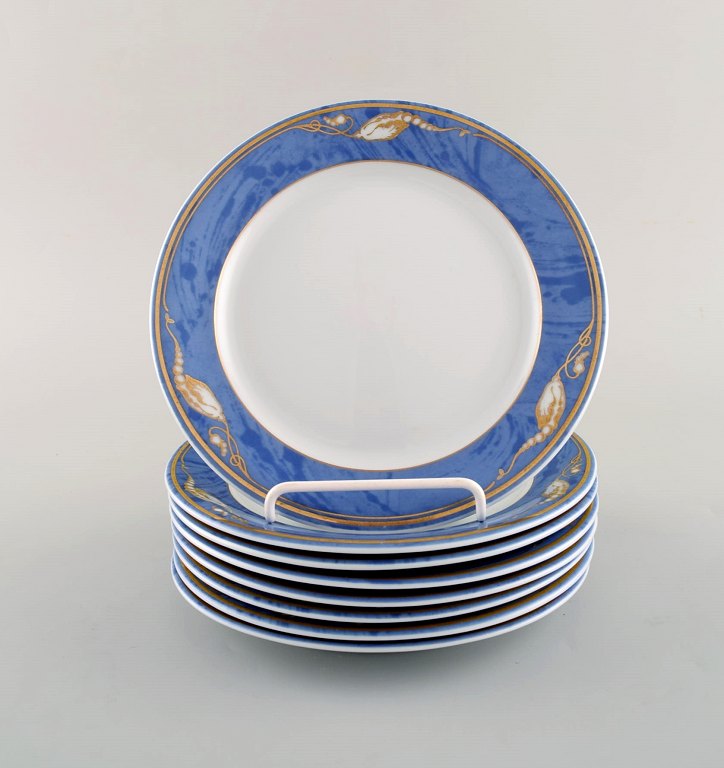 8 Royal Copenhagen Magnolia tallerkener. Sent 1900-tallet.