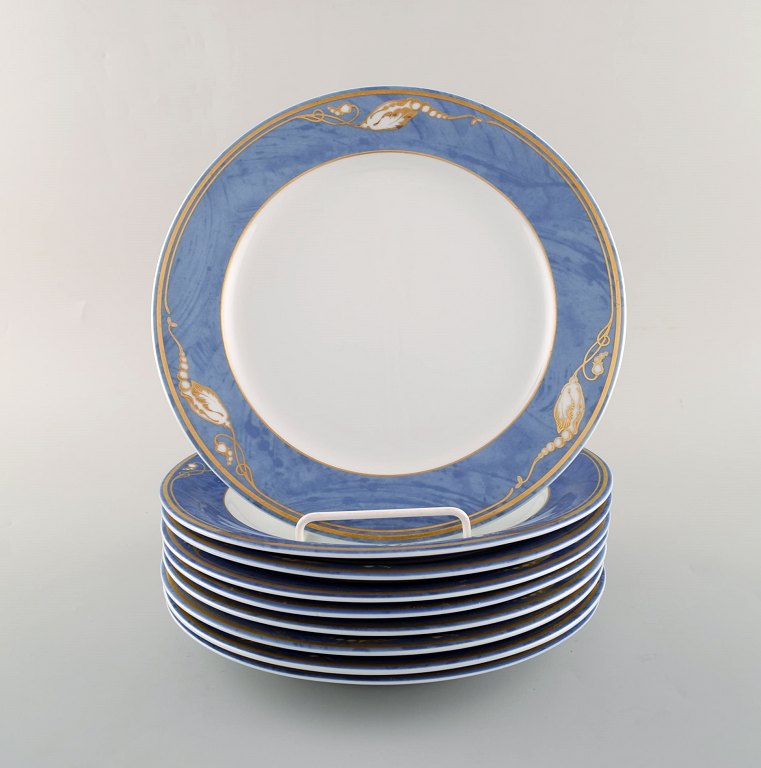 9 Royal Copenhagen Magnolia frokosttallerkener. Sent 1900-tallet.