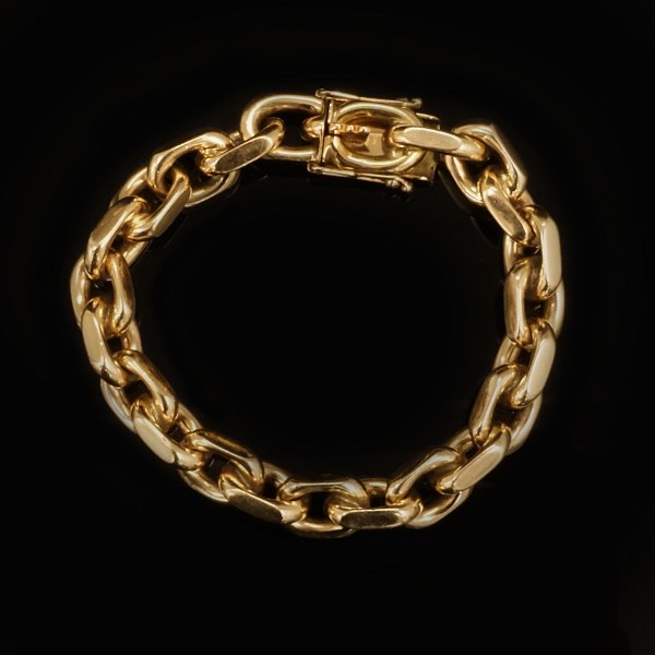 A 14kt gold anchor bracelet by Bjarne Nordmark Henriksen, Copenhagen. L: 20,5cm. W: 83,9gr