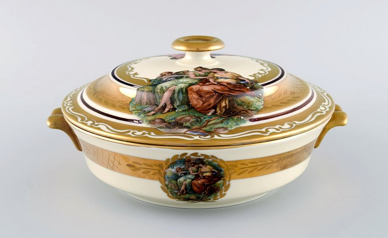 Royal Copenhagen lidded tureen in porcelain with romantic scenes and gold decoration. 20th century.