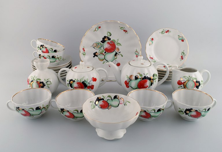 The Imperial Lomonosov Porcelain Factory, Soviet Union. Large tea service in hand-painted porcelain for six people. Mid-20th century.