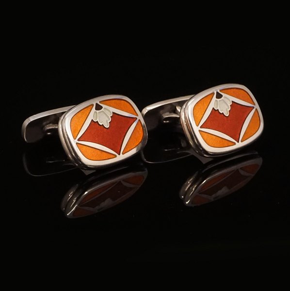 A pair of sterlingsilver and enamel cufflinks by Naja Salto for Georg Jensen. #602. Size: 1,6x2,2cm