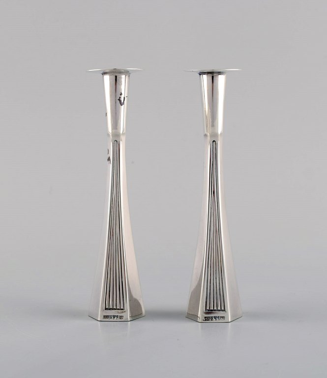 Wiwen Nilsson Lund, Sweden (b. 1897, d. 1974). A pair of modernist candlesticks in silver. Dated 1963.