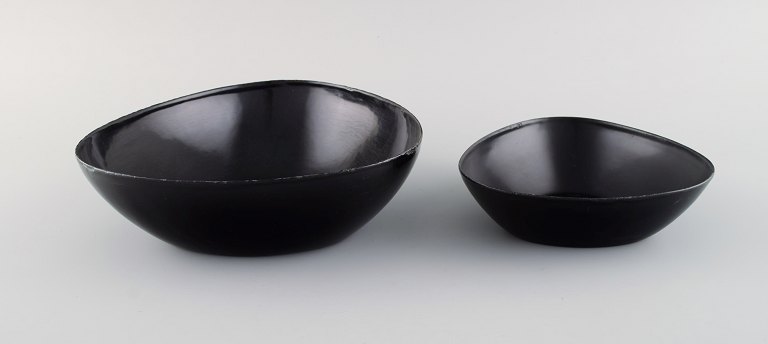 Kockum, Sweden. Two bowls in black enamel. 1970s.