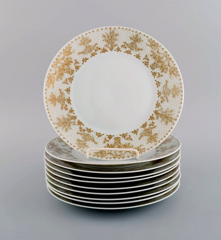 Bjørn Wiinblad for Rosenthal. 10 plates in porcelain with gold decoration. 1980s.