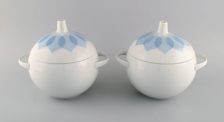 Bjørn Wiinblad for Rosenthal. Two Lotus porcelain lidded tureens decorated with light blue lotus leaves. 1980s.