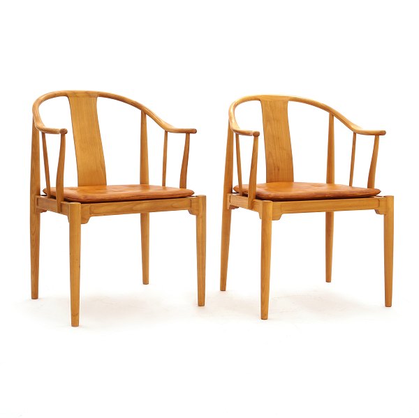 Hans J. Wegner: A pair of Chinachairs. Very nice patinated cherrywood. Produced by Fritz Hansen