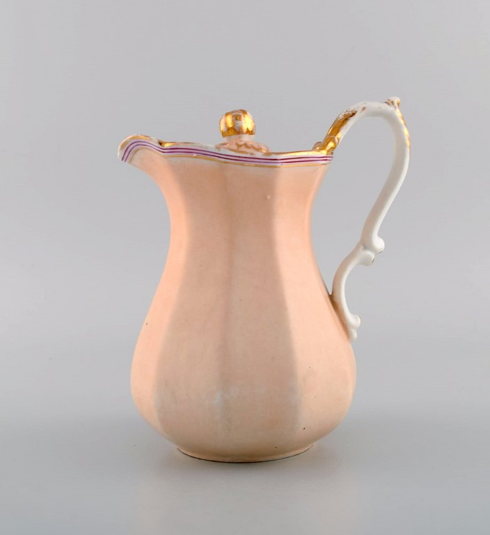 Antique Bing & Grøndahl chocolate jug in porcelain with hand-painted purple and gold decoration. Rare model. 1870s.