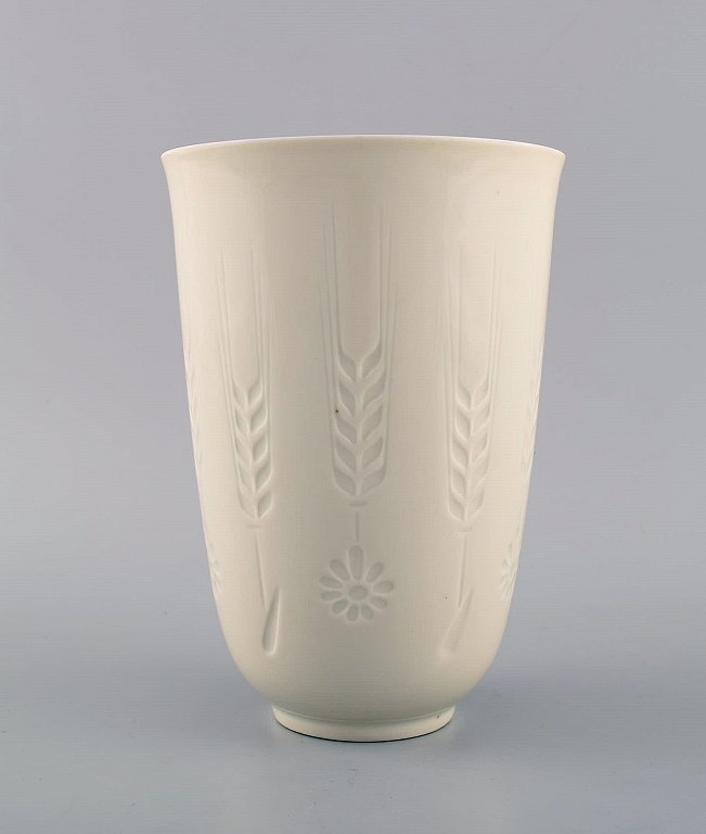 Royal Copenhagen blanc de chine vase with flowers and corn tassels in relief. Model number 4162. Dated 1975-79.