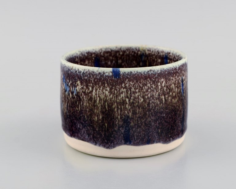European studio ceramicist. Unique vase in glazed stoneware. Beautiful glaze in eggplant shades. Late 20th century.