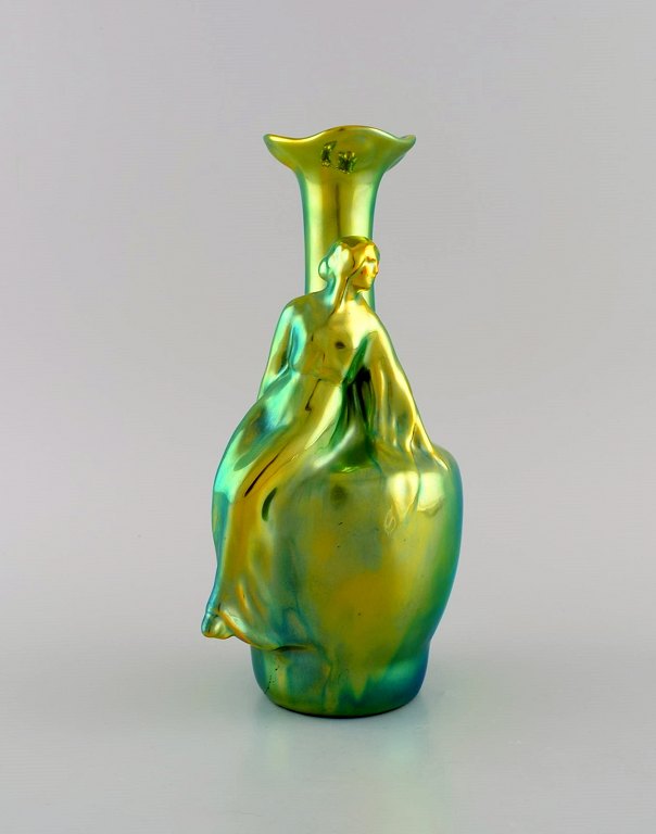 Zsolnay art nouveau vase in glazed ceramics modeled with sitting woman.  Beautiful luster glaze. 20th century.