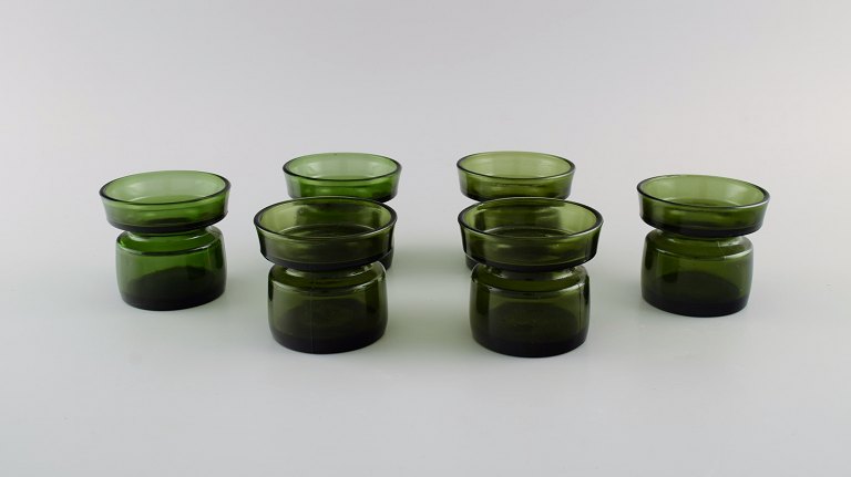 Jens Harald Quistgaard. Otte "Hyggelys" til fyrfadslys i mørkegrønt kunstglas. Retro, 1960