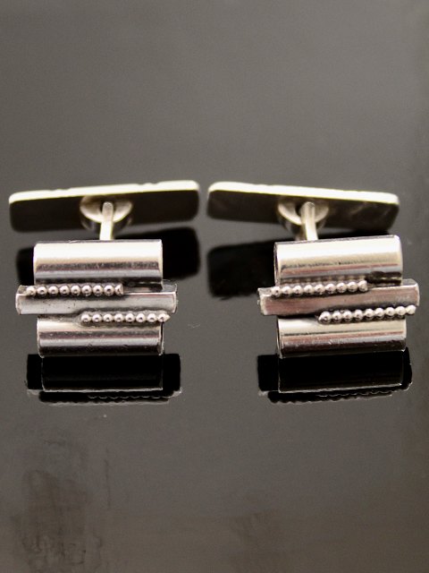 Art decomanchetknapper