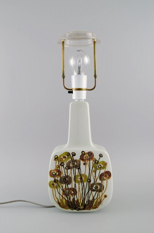 Royal Copenhagen retro table lamp in faience decorated with flowers. 1970s.