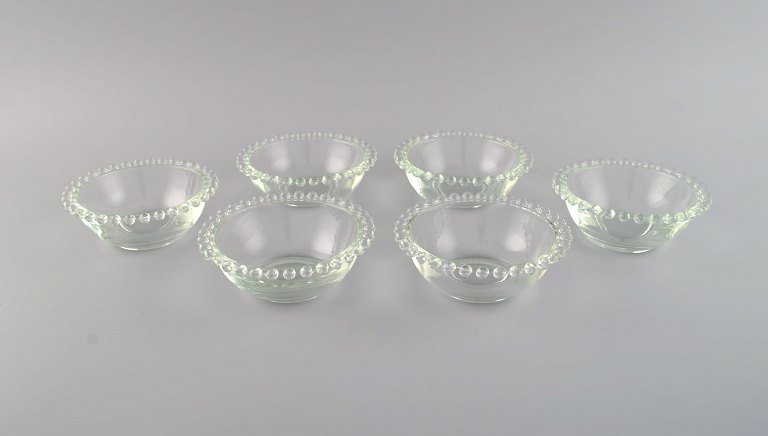 Seks skylleskåle i klart kunstglas. Frankrig, Midt 1900-tallet.