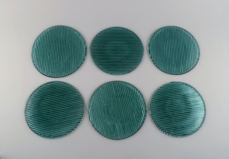 Per Lütken for Holmegaard. Six "Buffet" plates in blue-green mouth blown art glass. 1980s.