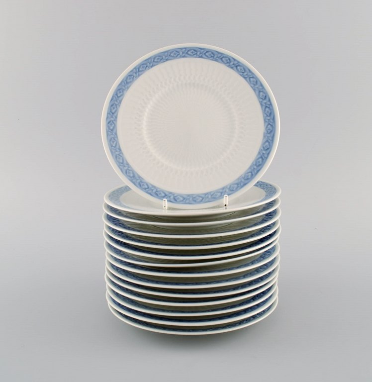14 Royal Copenhagen Blue Fan side plates. 1960s. Model number 1212/1522. Designed by Arnold Krog in 1909.