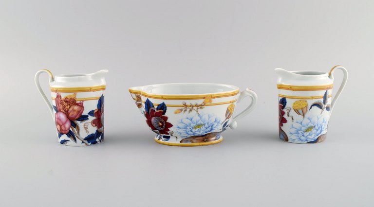 Porcelain of Paris. "Tropical Aurore". Three porcelain jugs decorated with flowers, pomegranates and bamboo. 1980s.