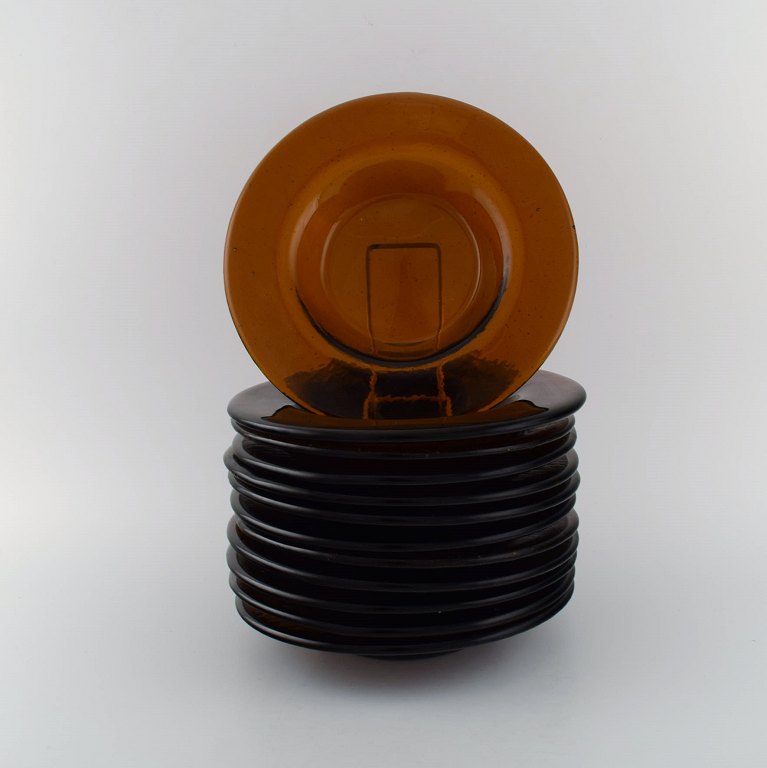 Swedish art glass. Twelve deep plates in smoky mouth-blown art glass. 1960/70s.