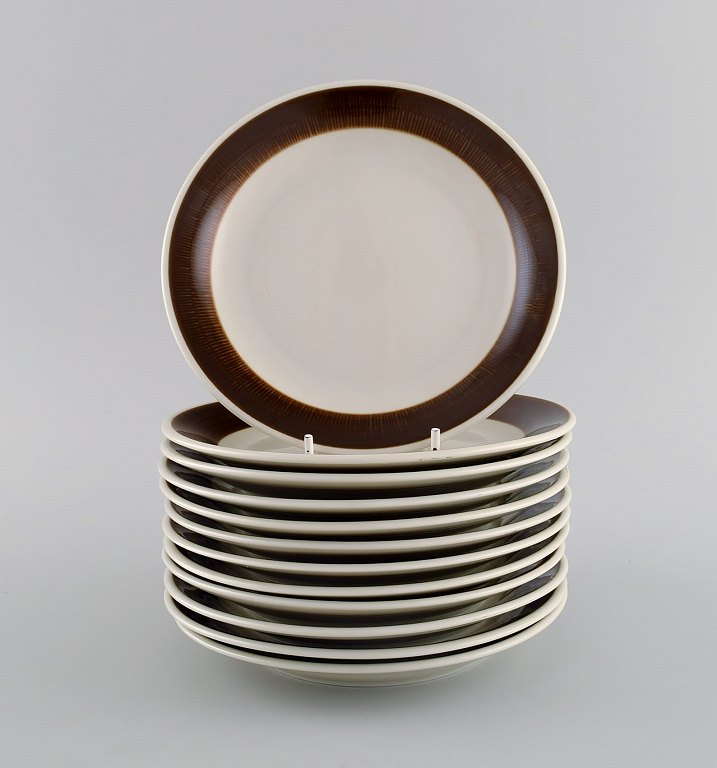 Hertha Bengtson (1917-1993) for Rörstrand. Twelve Koka cake plates in glazed stoneware. 1960s.