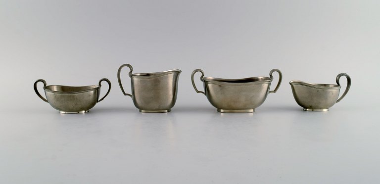 Just Andersen (1884-1943), Denmark. Two art deco tin sugar bowls and two creamers. 1940s.