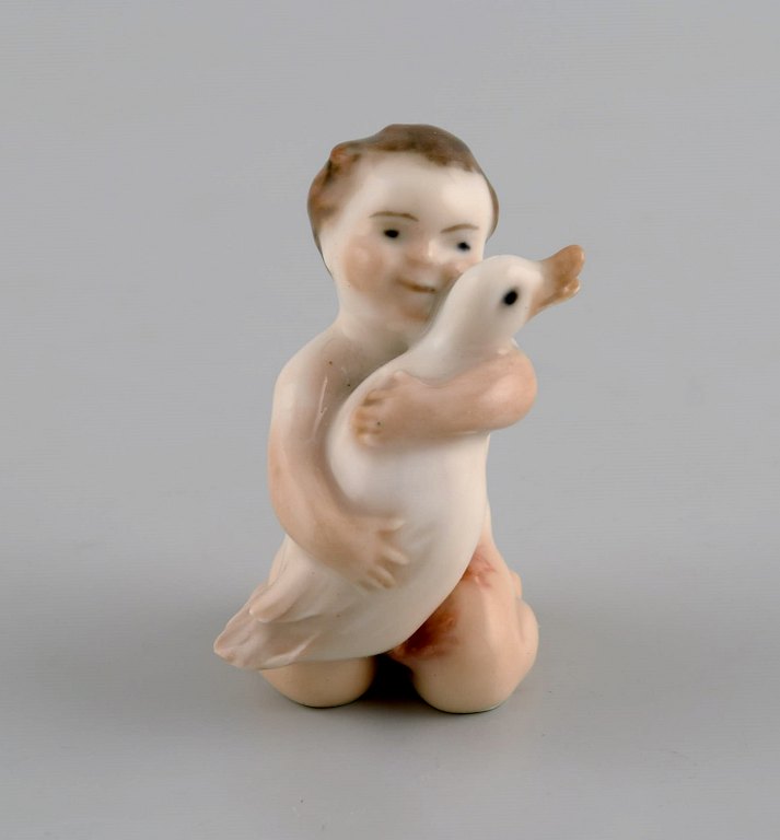 Rare Royal Copenhagen porcelain figure. Girl with duck. Model number 2332.