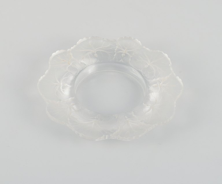 Lalique bottle tray in clear art glass with flower decoration.Approx. 1980.