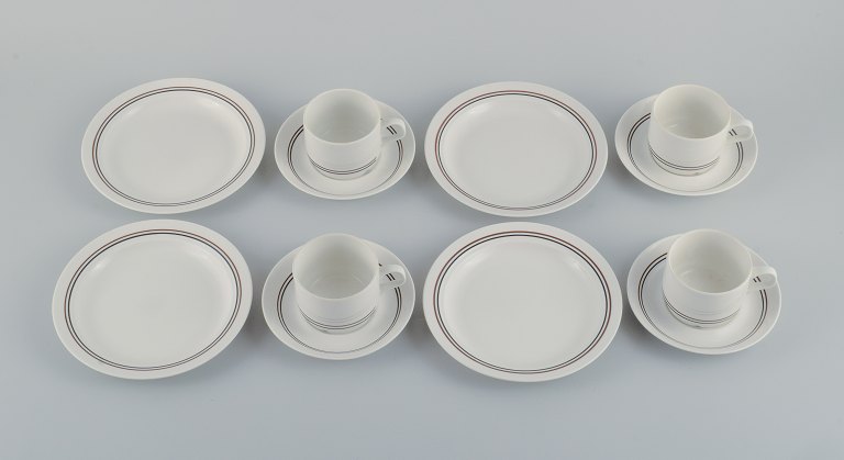 Rörstrand coffee service for four people. Swedish design, 1960s.Consisting of four coffee cups with saucers and four plates in glazed porcelain.